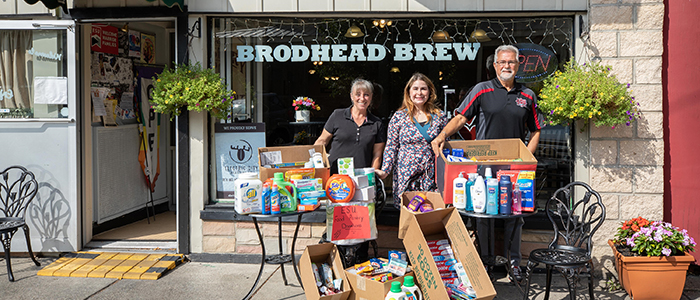 Warrior Food pantry donations on display in front of Brodhead Brew