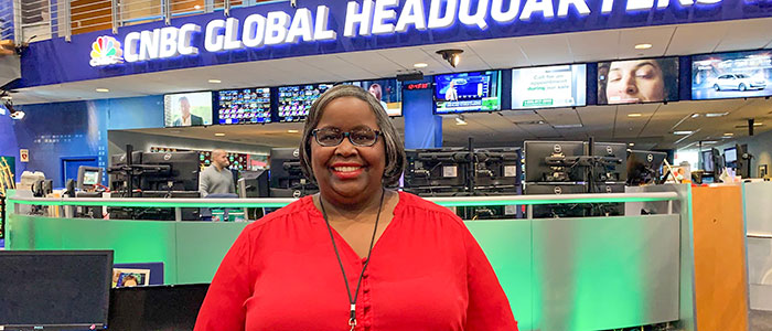 Melodie Warner at the news desk of CNBC.