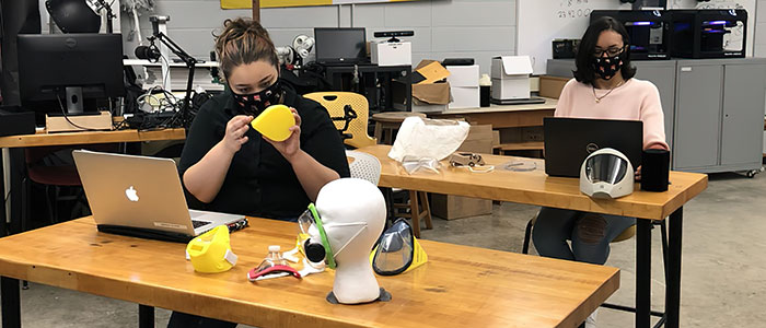 students working on face masks