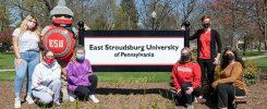 East Stroudsburg University students who took part in a U.S. Centers for Disease Control and Prevention study that looked at mask-wearing on 53 college campuses around the country pose with the Warrior mascot.